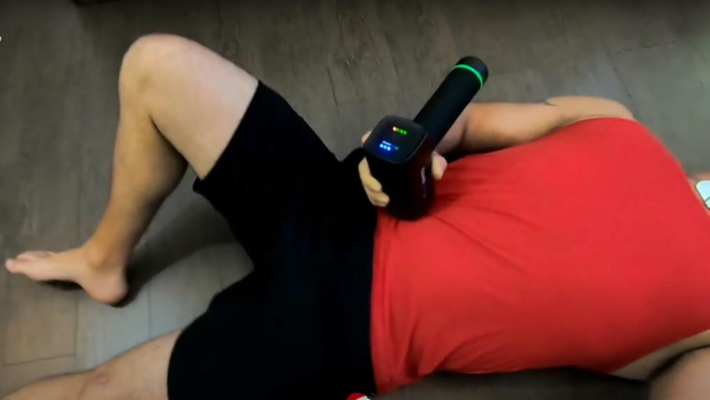 Massage Gun On Stomach